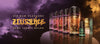 Zeus vape juice bottles with a dark, dramatic background